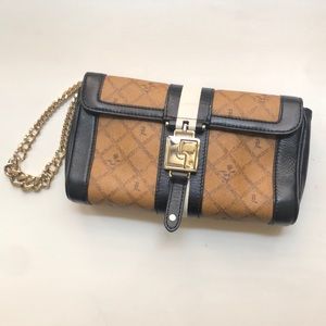 Authentic L.A.M.B. Clutch